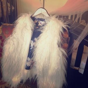 All white fur vest